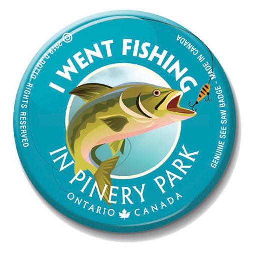 A button with an image of a fish and the words " i went fishing in pinery park."