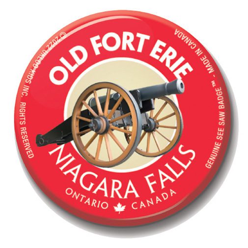 A button with an old fort erie logo on it.