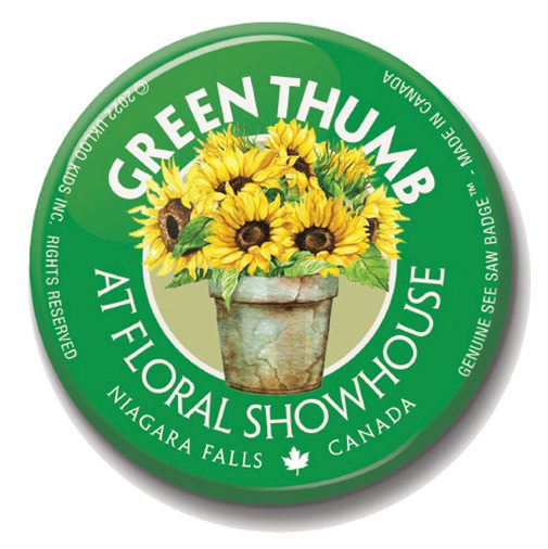A button with a picture of sunflowers in a green bucket.