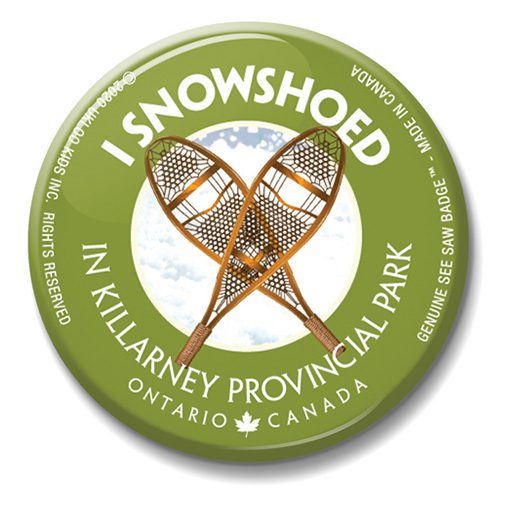 A button with two snowshoes on it.