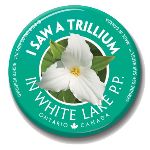 A button with a white flower on it.