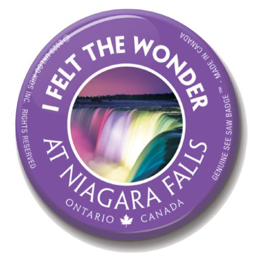 A purple button with the words " i felt the wonder at niagara falls ontario canada ".