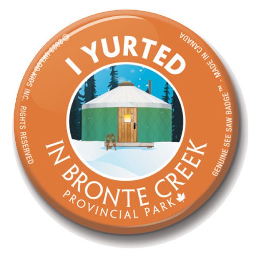 A button with an image of a yurt in bronte creek.