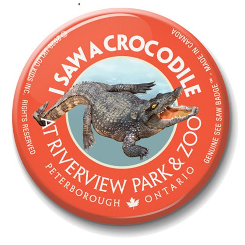 A red button with an image of a crocodile.