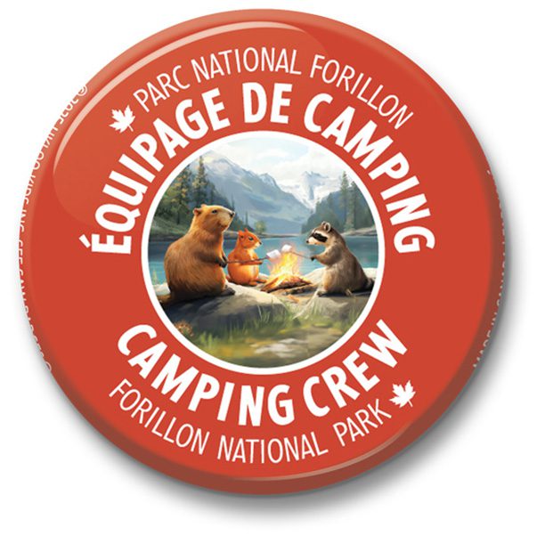 Round badge for Forillon National Park camping crew.