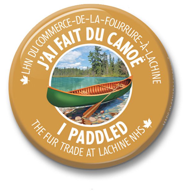 Vintage-style canoe paddling badge with a scenic lake and forest illustration.